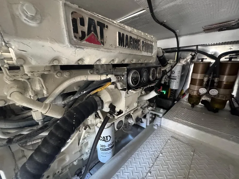 Slide: The Image of Engine room of 2000 Ocean Yachts 48 Convertible with CAT Marine Power engine. - 42
