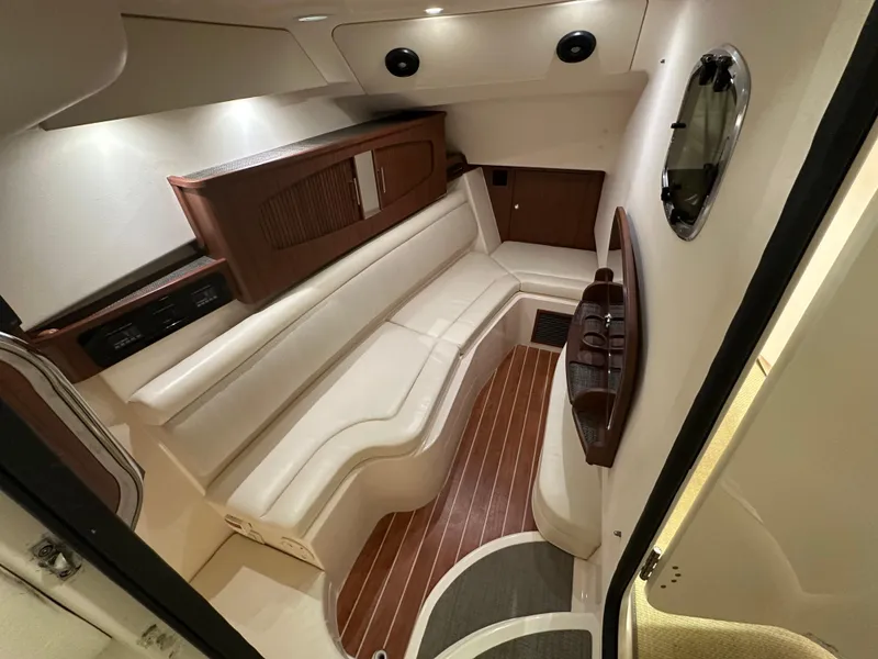 Slide: The Image of 2019 Grady-White Freedom 375 cabin interior with elegant seating and wood flooring. - 41