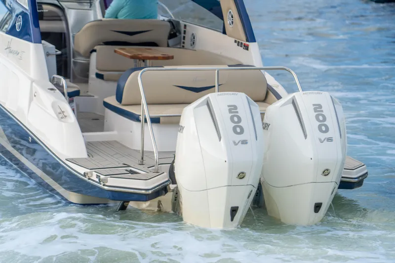 Slide: The Image of 2025 Hanover 305 Outboard Alpine Gray Ultimate Sport Edition with dual 200 V6 engines. - 16