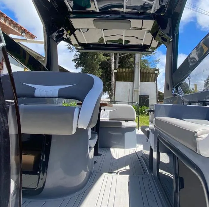 Slide: The Image of Interior of 2025 Hanover 305 Outboard Alpine Gray Ultimate Sport Edition boat. - 2