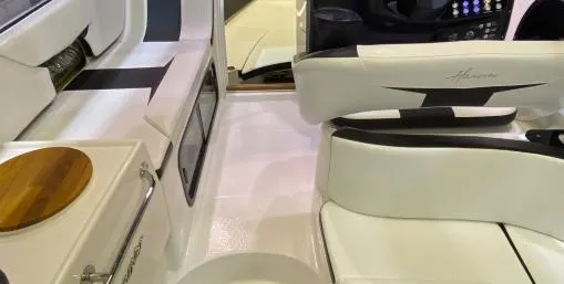 Slide: The Image of Interior of 2025 Hanover 305 Outboard Black & White T-Top Edition boat. - 7