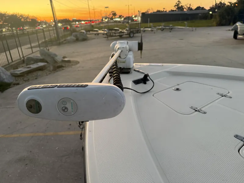 Slide: The Image of Bow of a 2013 BlackJack 224 boat with trolling motor at sunset. - 11