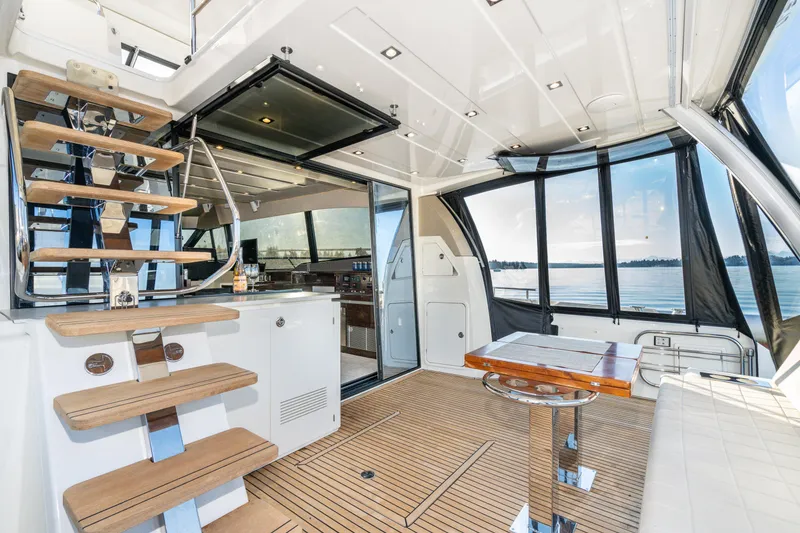 Slide: The Image of Luxurious interior of 2018 Prestige 630 yacht with wooden flooring and modern design. - 24