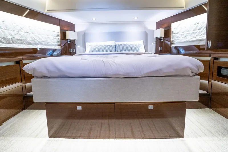 Slide: The Image of Luxurious bedroom interior of 2018 Prestige 630 yacht with modern design and elegant furnishings. - 45