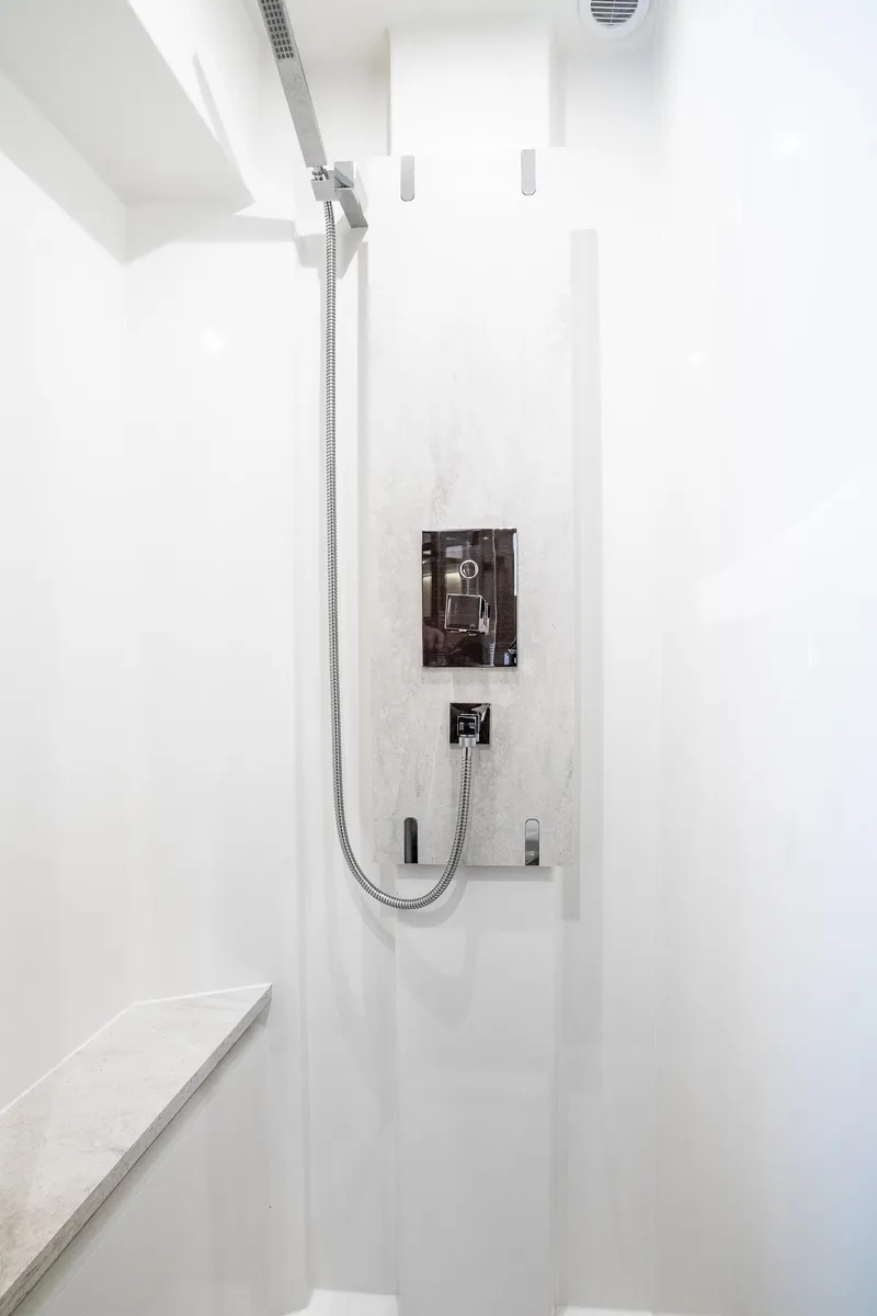 Slide: The Image of Modern shower in 2018 Prestige 630 yacht, featuring sleek design and chrome fixtures. - 51
