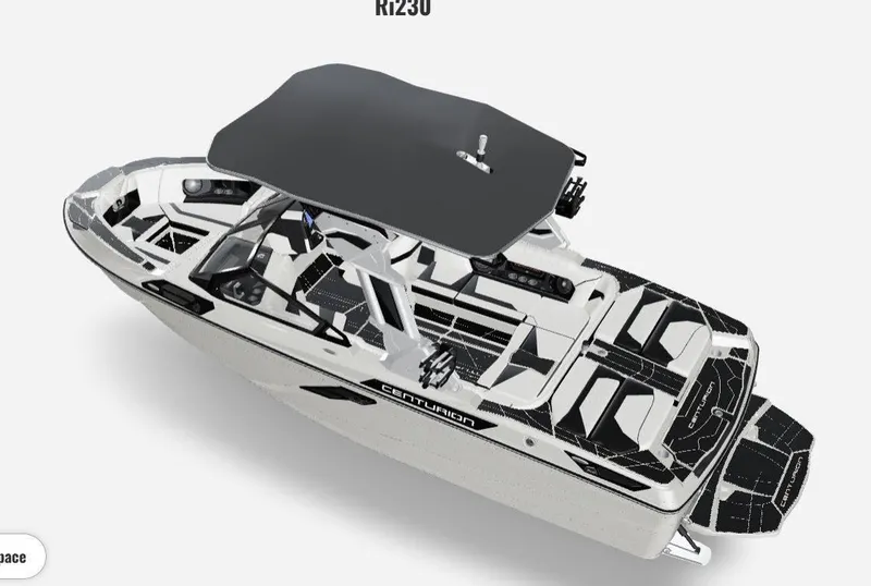 Slide: The Image of 2025 Centurion Ri230 boat with sleek design and spacious interior. - 2