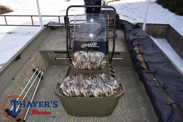 Slide: The Image of 2023 Tracker GRIZZLY® 2072 CC boat with camo seats at Thayer's Marine. - 20