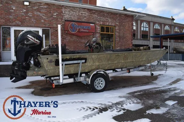 Slide: The Image of 2023 Tracker GRIZZLY® 2072 CC boat on trailer at Thayer's Marine. - 3