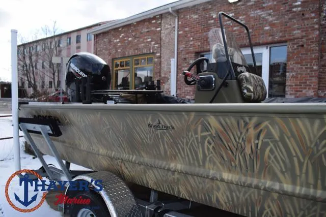 Slide: The Image of 2023 Tracker GRIZZLY® 2072 CC boat with camouflage design on a trailer. - 33
