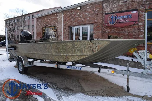 Slide: The Image of 2023 Tracker GRIZZLY® 2072 CC boat on trailer outside Thayer's Marine. - 34