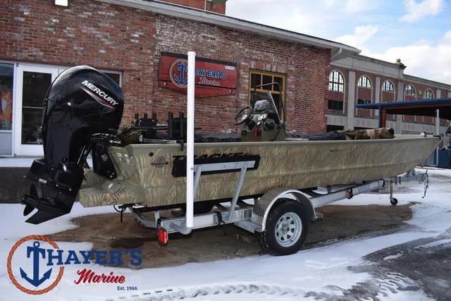 Slide: The Image of 2023 Tracker GRIZZLY® 2072 CC boat on trailer at Thayer's Marine. - 35