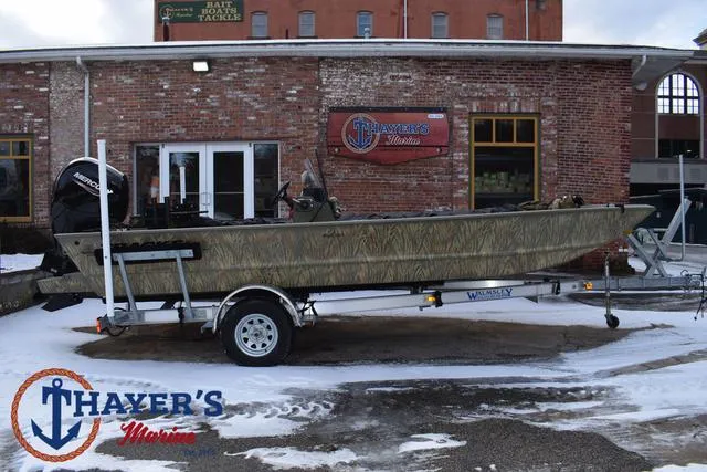 Slide: The Image of 2023 Tracker GRIZZLY® 2072 CC boat on trailer outside Thayer's Marine. - 36