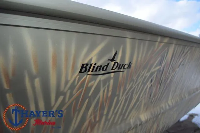Slide: The Image of 2023 Tracker GRIZZLY® 2072 CC boat with "Blind Duck" camo design, Thayer's Marine logo. - 5