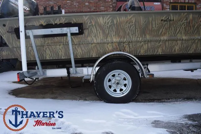 Slide: The Image of 2023 Tracker GRIZZLY® 2072 CC boat on trailer at Thayer's Marine. - 6