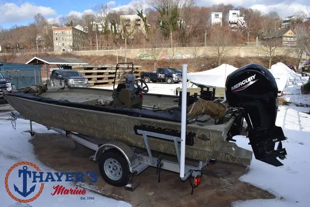 Slide: The Image of 2023 Tracker GRIZZLY® 2072 CC boat on trailer with Mercury engine, Thayer's Marine logo. - 8