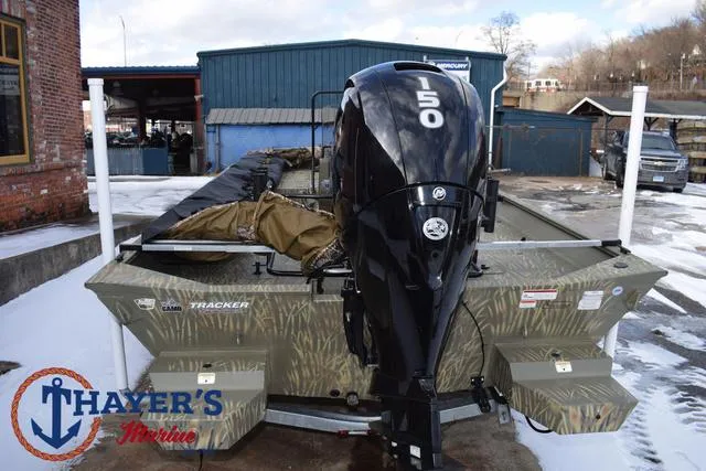 Slide: The Image of 2023 Tracker GRIZZLY® 2072 CC boat with 50 HP engine, parked outdoors. - 9