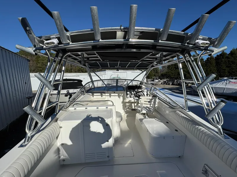 Slide: The Image of 2008 Fountain 38 Sportfish Express Cruiser with rod holders and spacious deck. - 16