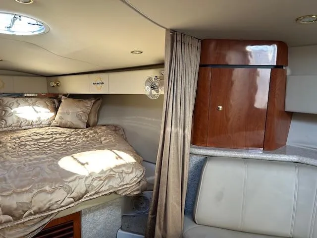 Slide: The Image of Interior of 2008 Fountain 38 Sportfish Express Cruiser with bed and wooden cabinetry. - 32