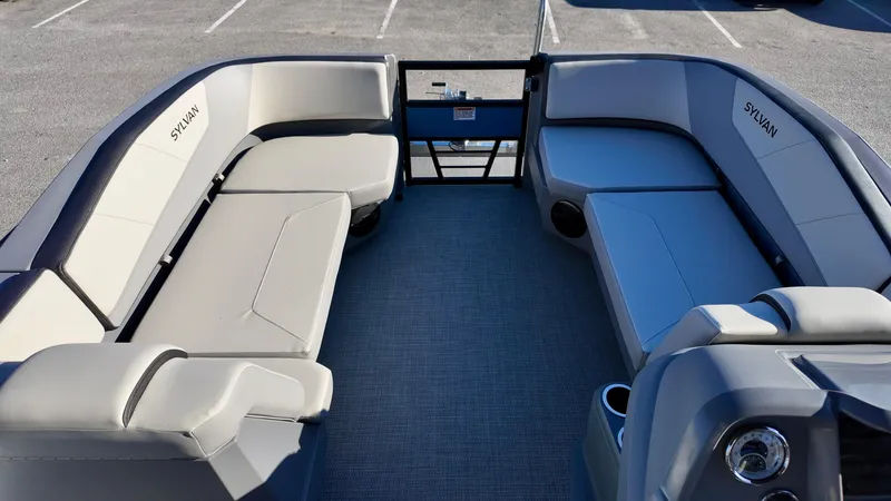 Slide: The Image of 2025 Sylvan A-Series A20 LZ DH pontoon boat interior with spacious seating. - 7