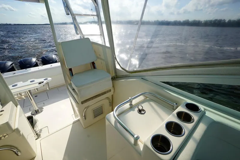 Slide: The Image of 2009 Contender 38 Express helm with dual seats and navigation equipment. - 6
