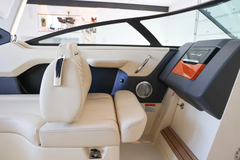 Slide: The Image of Interior of 2026 Chris-Craft Sportster 28, featuring luxurious seating and modern dashboard design. - 5