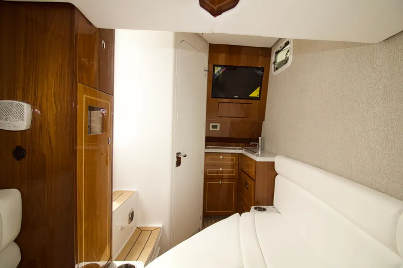 Slide: The Image of Luxurious interior of 2026 HCB 42 Lujo yacht with wood finishes and modern amenities. - 18