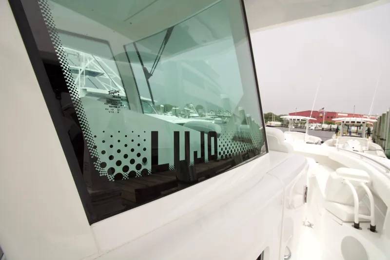Slide: The Image of HCB 42 Lujo 2026 boat with sleek design and modern window graphics. - 21