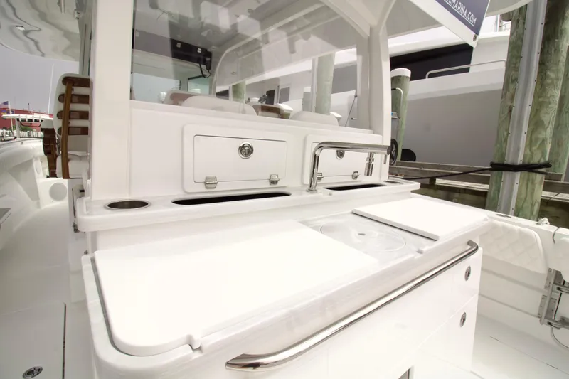 Slide: The Image of 2026 HCB 42 Lujo boat interior with sleek white cabinetry and modern fixtures. - 28