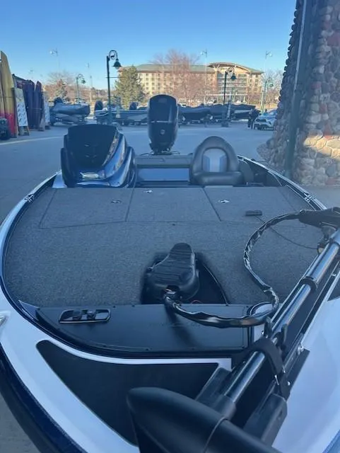 Slide: The Image of 2025 Nitro Z17 boat with spacious deck, parked outdoors. - 3