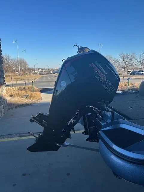 Slide: The Image of 2025 Nitro Z17 boat with powerful outboard motor in a sunny outdoor setting. - 4