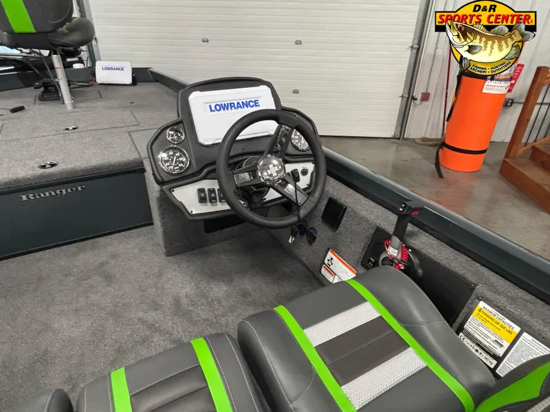 Slide: The Image of 2025 Ranger RT188C boat interior with Lowrance electronics and steering wheel at D&R Sports Center. - 4