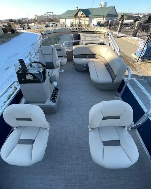 Slide: The Image of 2025 Sun Tracker Bass Buggy 18 DLX pontoon boat with spacious seating and modern design. - 5