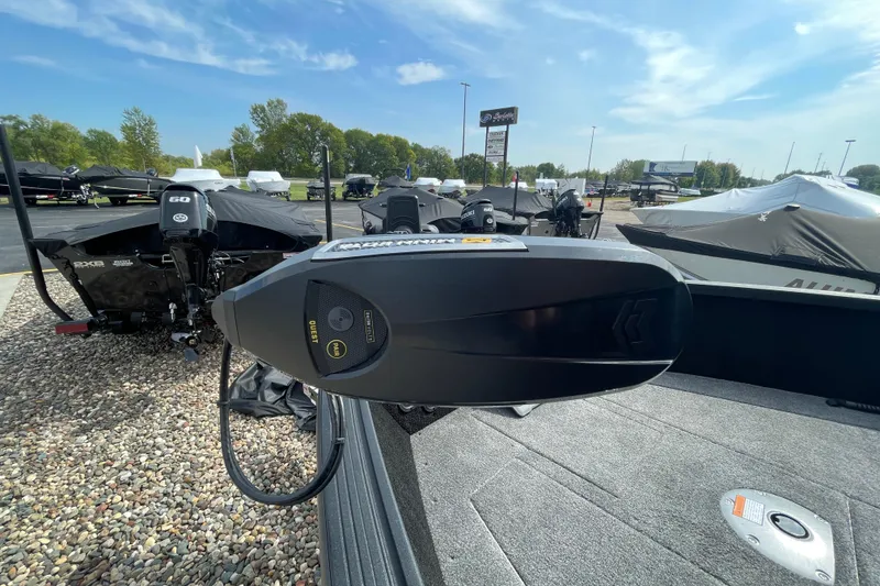 Slide: The Image of 2025 Alumacraft Trophy 185X Sport boat storage compartment with open hatch, revealing interior components. - 39