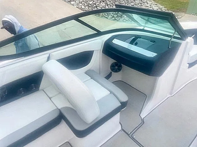Slide: The Image of 2021 Regal 2000 ES Bowrider interior with white and gray seating. - 7