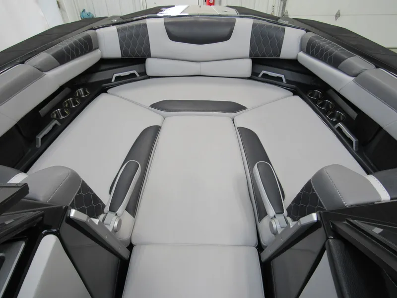 Slide: The Image of 2020 Malibu M240 boat interior with luxurious seating and modern design. - 10
