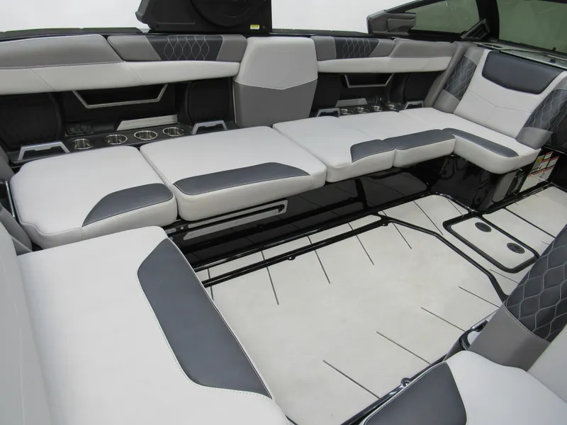 Slide: The Image of 2020 Malibu M240 boat interior with luxurious seating and modern design. - 6