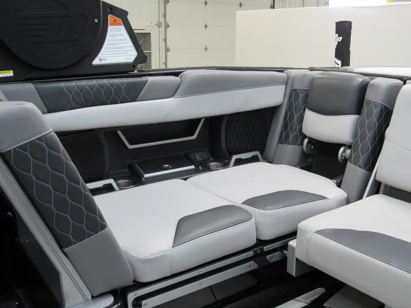Slide: The Image of 2020 Malibu M240 boat interior with gray and white leather seating. - 7