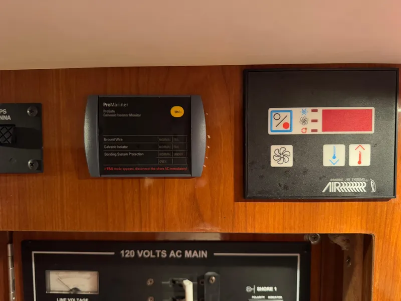 Slide: The Image of Control panel of a 2005 Regal 3350 Sport Cruiser with electrical and system indicators. - 24