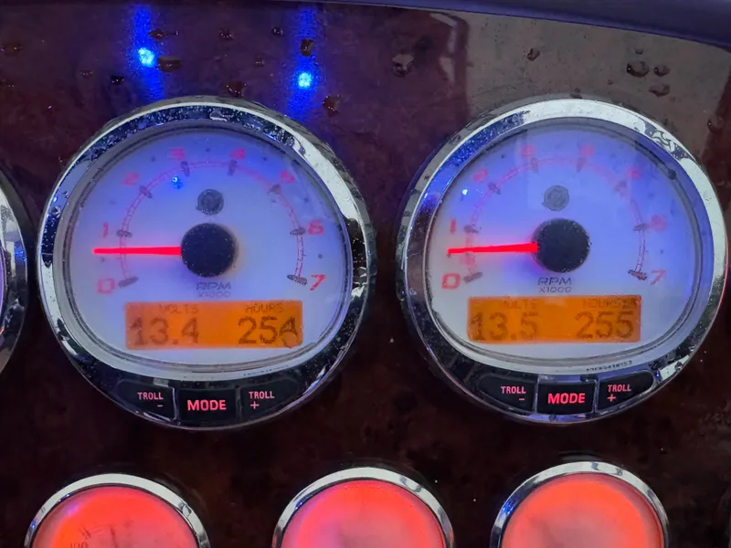 Slide: The Image of Dashboard gauges of a 2005 Regal 3350 Sport Cruiser boat. - 28