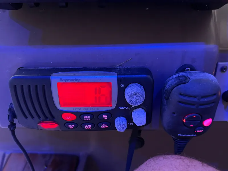 Slide: The Image of VHF radio system on 2005 Regal 3350 Sport Cruiser, displaying channel 16. - 29