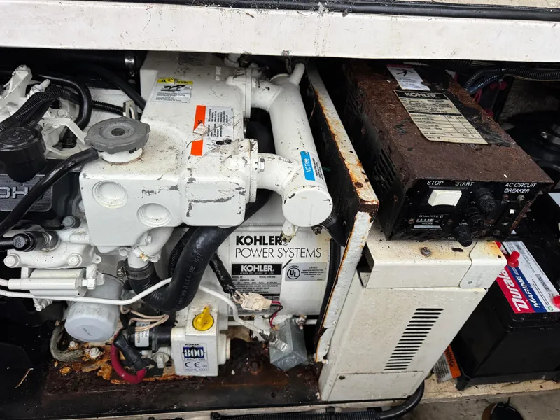 Slide: The Image of Engine compartment of 2005 Regal 3350 Sport Cruiser with Kohler power systems. - 32