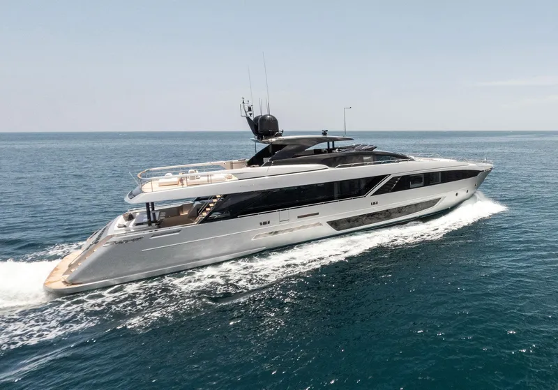 Slide: The Image of 2023 Riva Dolcevita yacht cruising on open sea, showcasing sleek design and luxury. - 2