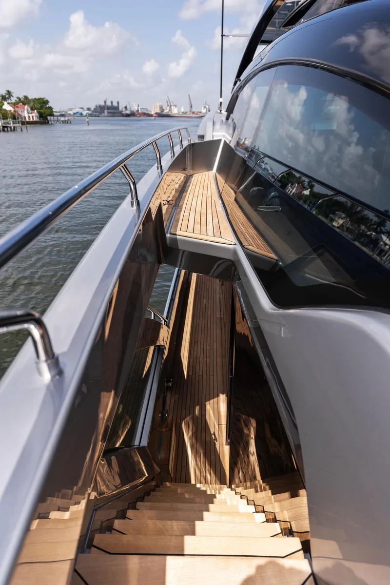 Slide: The Image of Luxurious 2023 Riva Dolcevita yacht deck with elegant seating and scenic ocean view. - 28