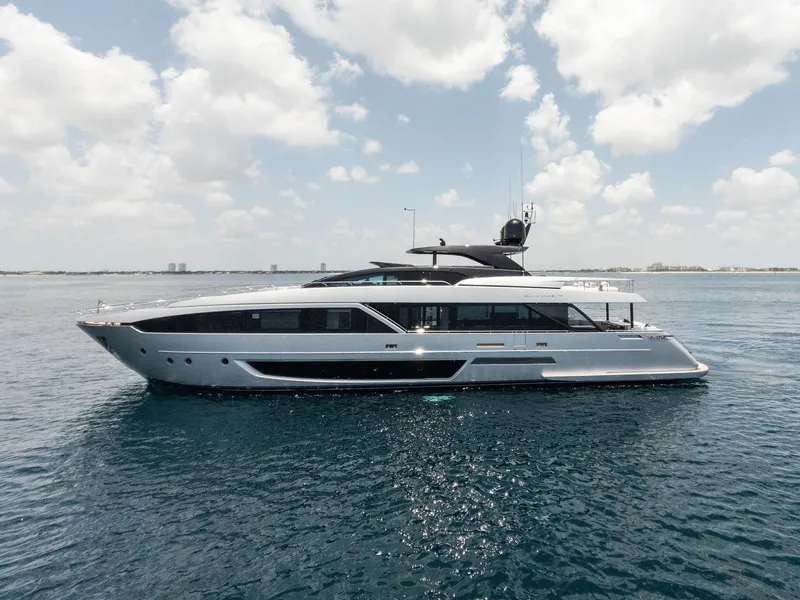 Slide: The Image of 2023 Riva Dolcevita yacht on calm ocean under cloudy sky. - 4