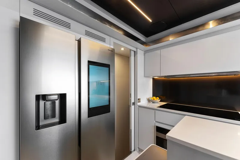 Slide: The Image of Modern kitchen interior on 2023 Riva Dolcevita yacht with ocean view. - 47