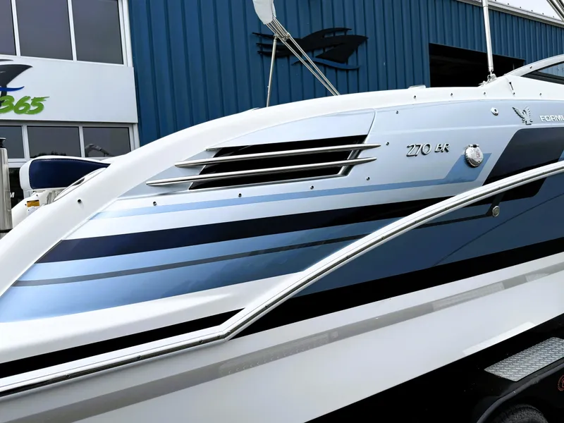 Slide: The Image of 2025 Formula 270 Bowrider boat with sleek design and modern detailing. - 11