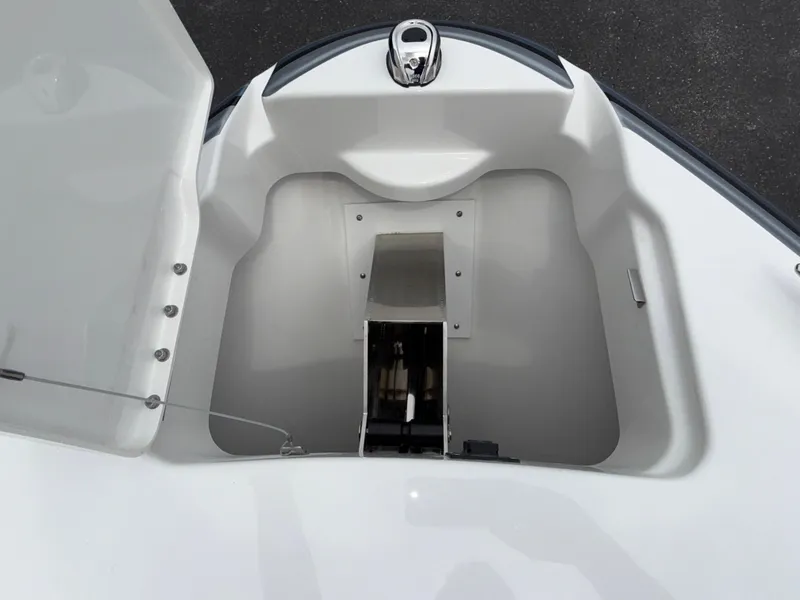 Slide: The Image of 2025 Formula 270 Bowrider anchor storage compartment with open hatch. - 13