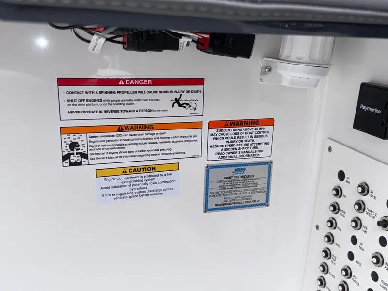 Slide: The Image of Safety warning labels on a 2025 Formula 270 Bowrider boat dashboard. - 17