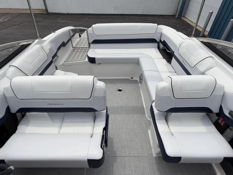 Slide: The Image of 2025 Formula 270 Bowrider interior with spacious white seating and modern design. - 20