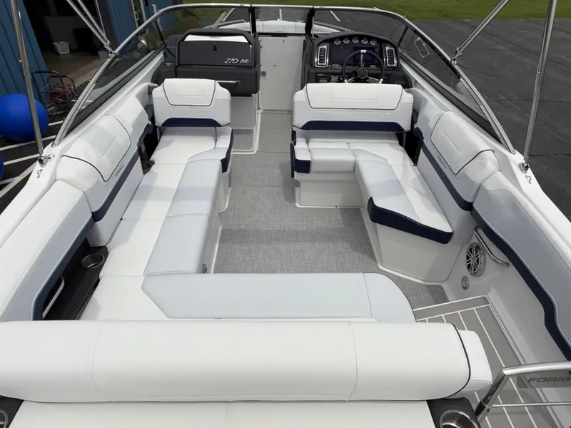 Slide: The Image of 2025 Formula 270 Bowrider interior with spacious seating and modern dashboard. - 22